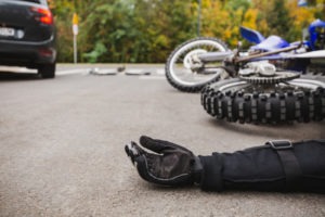 Motorcycle collision with commercial vehicle