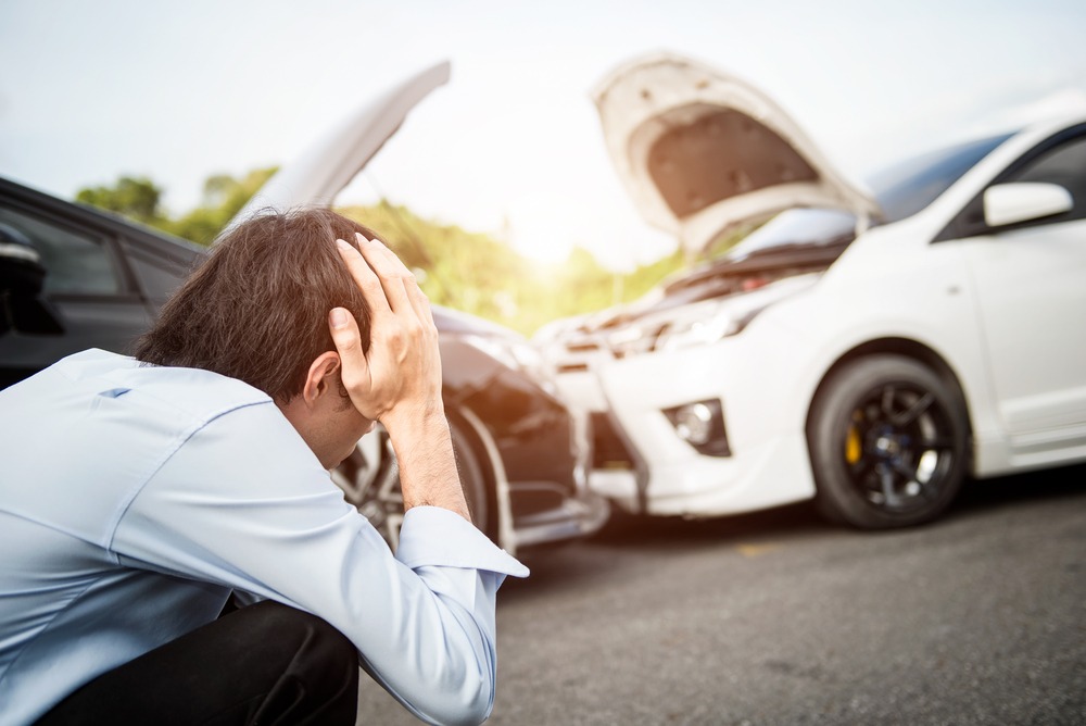 man stressing over car accident - Fort Worth, TX | Domingo Garcia Law Firm
